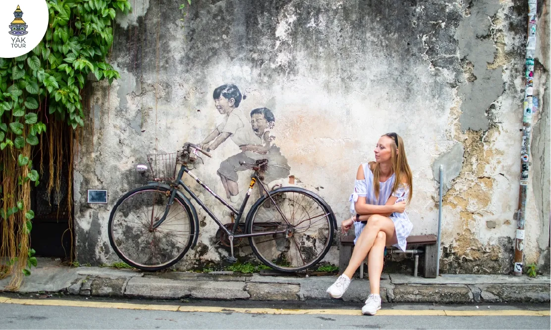 ภาพวาดสตรีทอาร์ทเด็กปั่นจักรยานชื่อดัง ย่านจอร์จทาวน์ เมืองเก่าปีนัง