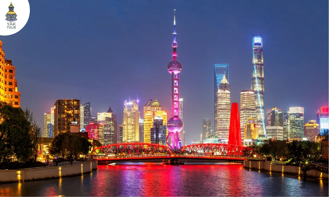 สะพาน Waibaidu จุดถ่ายรูปยอดฮิตเห็นวิวหอไขมุกและแม่น้ำยามค่ำคืน